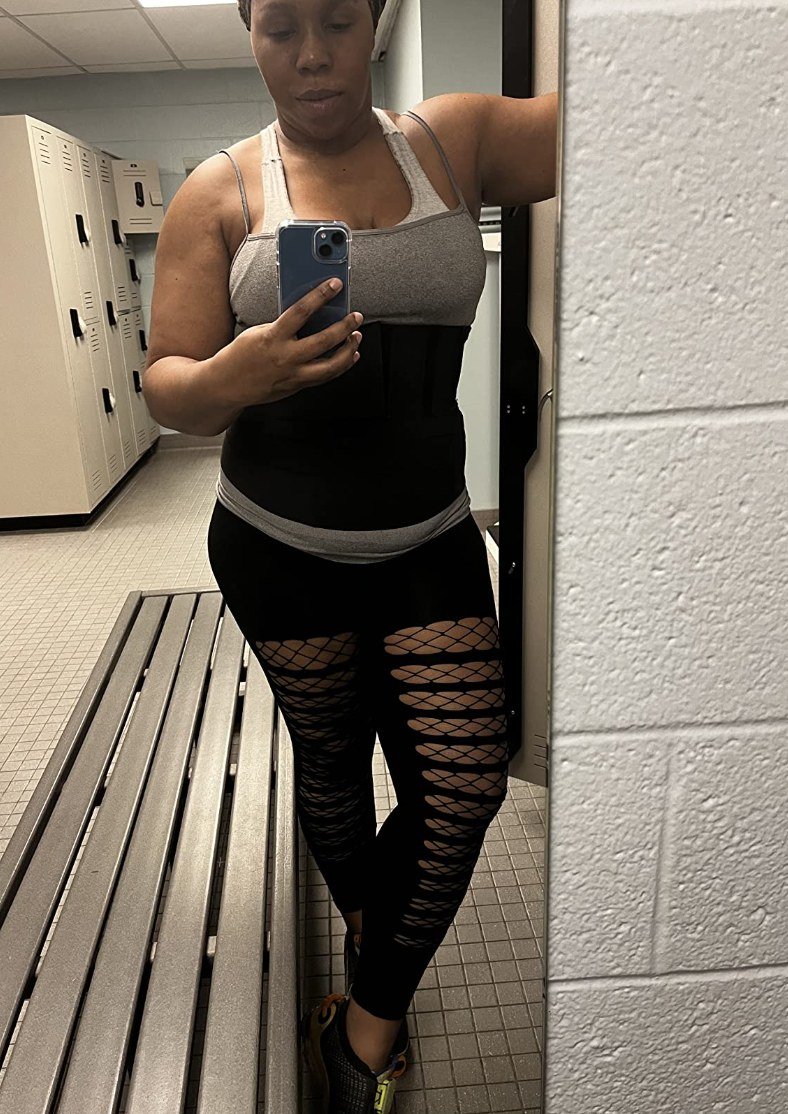 Customer wearing waist trainer at the gym